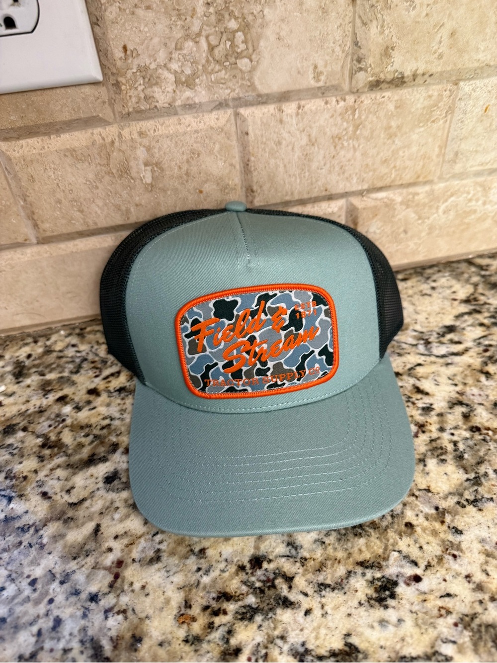 Field & Stream Seafoam and Black Trucker Hat with Orange Camo Patch